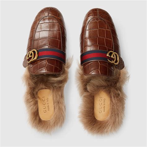 gucci crocodile slippers.